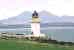 the Paps of Jura behind the lighthouse